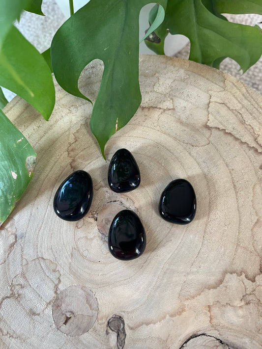 Onyx Trommelstein gebohrt