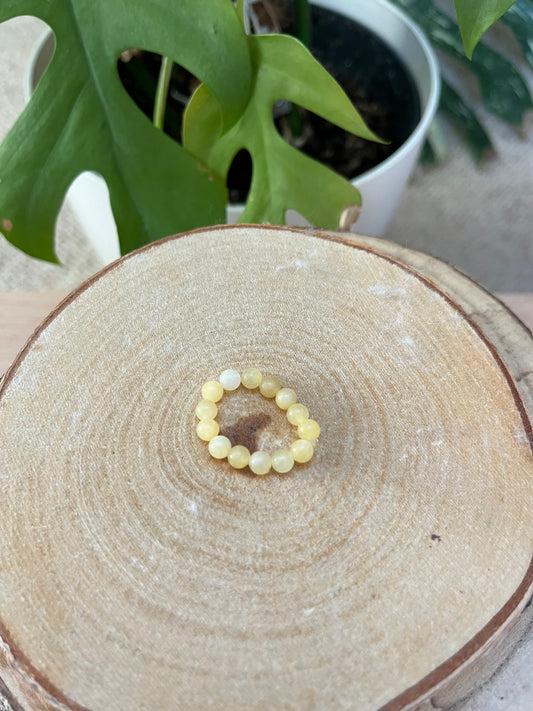 Orangen Calcit Ring elastisch - 5mm Kugeln